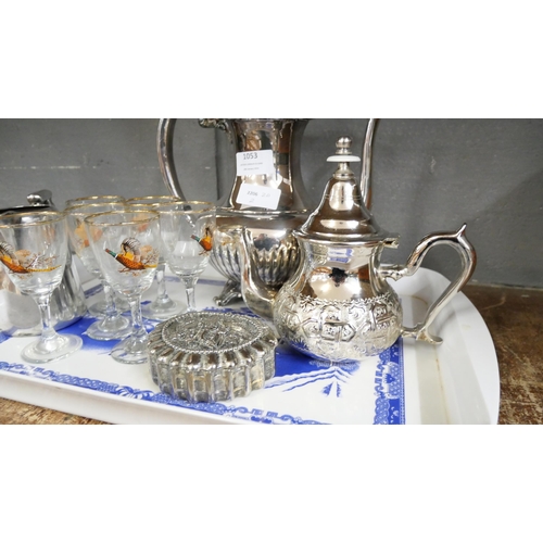 1053 - A silver plated coffee pot, a teapot, a trinket box and a jug, a set of six glasses decorated with p... 