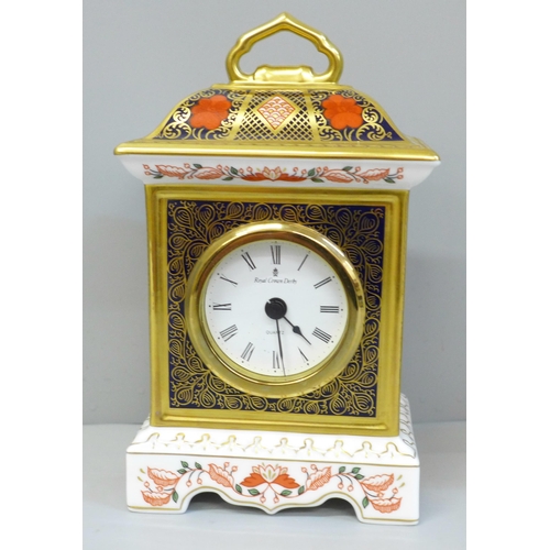 601 - A Royal Crown Derby 1128 pattern Old Imari clock, 18cm