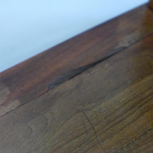 616 - A mahogany sliding book shelf, 32cm-54cm, a/f