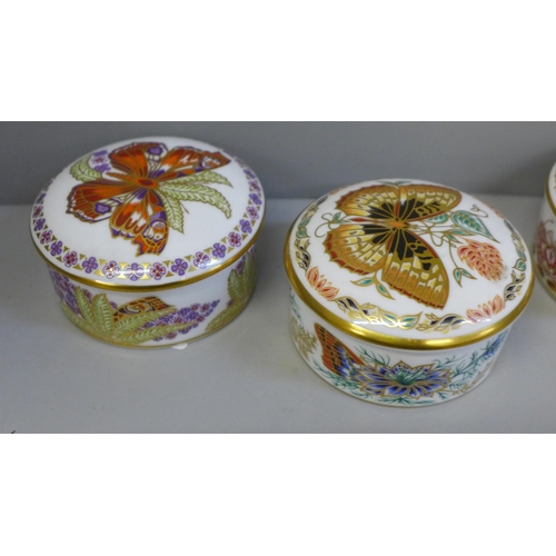 644 - Four Royal Crown Derby Butterflies of the World lidded pots, USA, Europe, Great Britain and Eastern