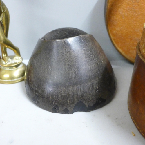 649 - A horseshoe pin cushion, two wooden shoe lasts, a leather collar box and a brass model of Krishna