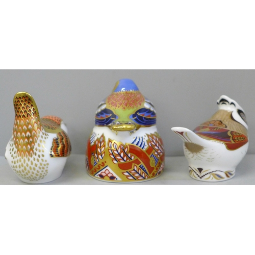 662 - Three Royal Crown Derby bird paperweights, all with gold stoppers, including a Collector's Guild Cha... 