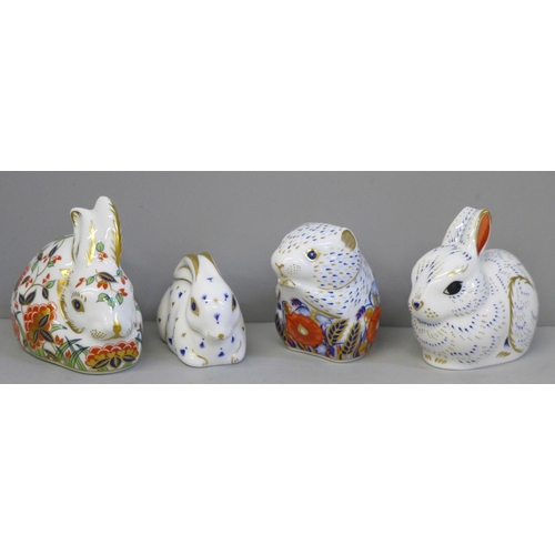 663 - Three Royal Crown Derby rabbit paperweights, all with gold stoppers, and a Poppy Mouse, gold stopper