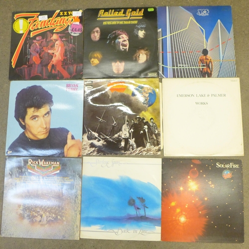 674 - A collection of nine rock LP records, ZZ Top, Yes, Bryan Ferry, EL&P, etc.