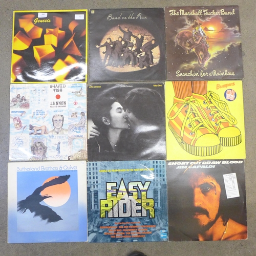 684 - A collection of nine rock LP records including Genesis, Wings, John Lennon