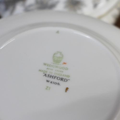 694 - Wedgwood Ashford dinnerwares, two oval serving plates, two vegetable dishes and covers and dinner pl... 