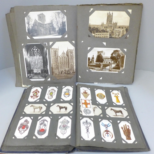 695 - An albums of church postcards and an album of Edwardian cigarette cards