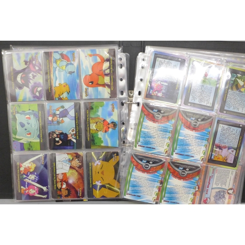 699 - A collection of 218 Topps Pokemon cards, 1999, including 131 blue logo first editions, (9 holo and 2... 