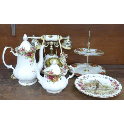 701 - A Royal Albert Old Country Roses telephone, a two-tier cake stand, a coffee pot, small teapot and a ... 