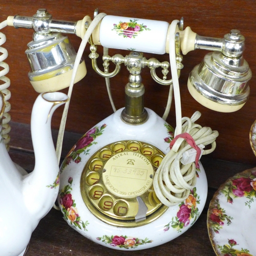 701 - A Royal Albert Old Country Roses telephone, a two-tier cake stand, a coffee pot, small teapot and a ... 