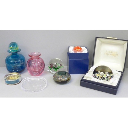 705 - A collection of glass paperweights including Caithness and a Mdina glass scent bottle