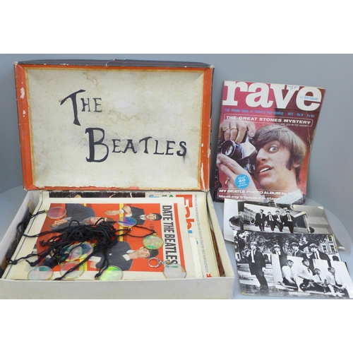 709 - The Beatles memorabilia including photographs, magazines, scrapbook and The Beatles holographic pend... 