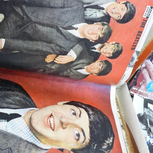 709 - The Beatles memorabilia including photographs, magazines, scrapbook and The Beatles holographic pend... 