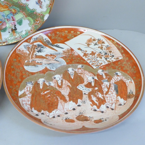 710 - A pair of Japanese Kutani plates and a Chinese export porcelain famille rose plate, chip to edge