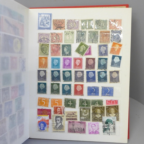 712 - Stamps; a box of stamp albums, covers, etc.