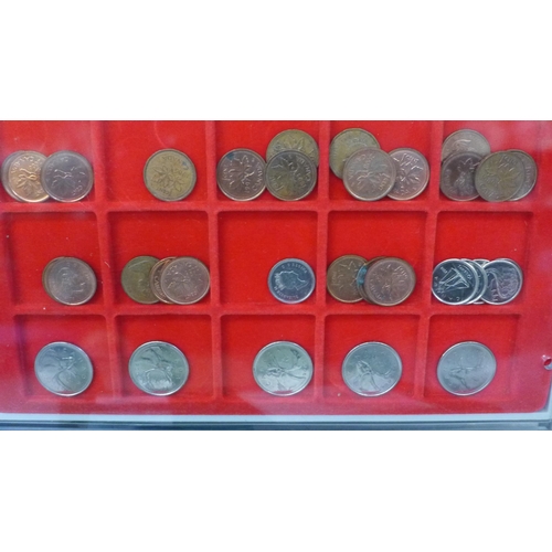 721 - Four Lindner coin trays with US and Canadian coins