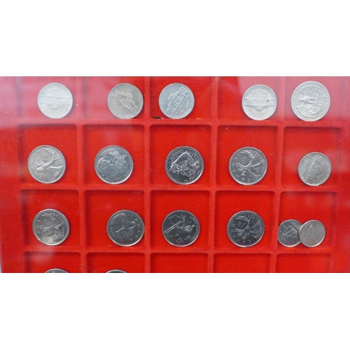 721 - Four Lindner coin trays with US and Canadian coins