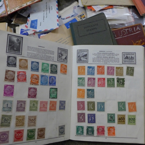 725 - World stamps; typical three generation family stamp collection housed in several albums including tw... 