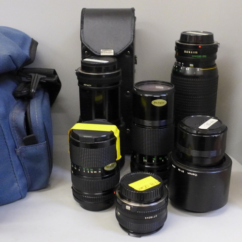 731 - Six Canon camera lenses, 100-300mm, 70-210mm, 200mm, 135mm, 35-70mm and 50mm