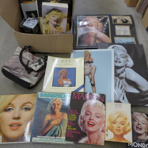 732 - A box of Marilyn Monroe memorabilia including prints, calendars, books, etc.