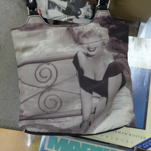 732 - A box of Marilyn Monroe memorabilia including prints, calendars, books, etc.