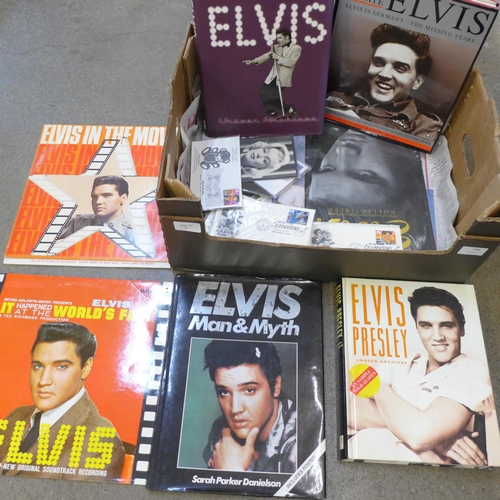 746 - A collection of Elvis Presley books, (7), three LP records, first day covers, Marilyn Monroe postcar... 