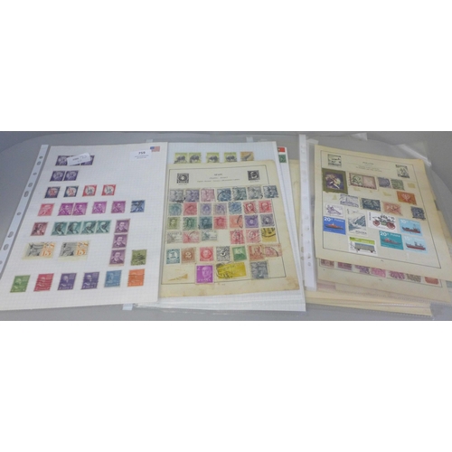 759 - A collection of postage stamps and a page of Tonga Air Mail stamps