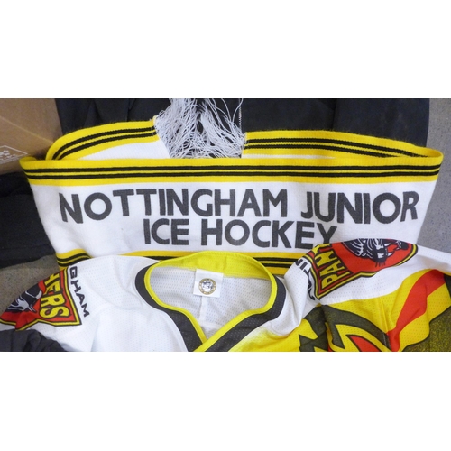 778 - A collection of Nottingham Panthers ice hockey items including a shirt, hat, scarf, T-shirt, jacket,... 