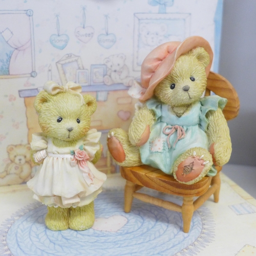 786 - A Cherished Teddies house display stand and three bears, boxed