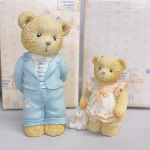 786 - A Cherished Teddies house display stand and three bears, boxed