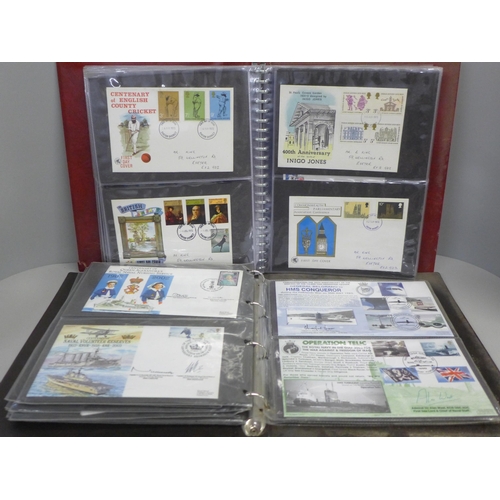 796 - A collection of first day covers in two albums, one Navy related and the other containing assorted f... 