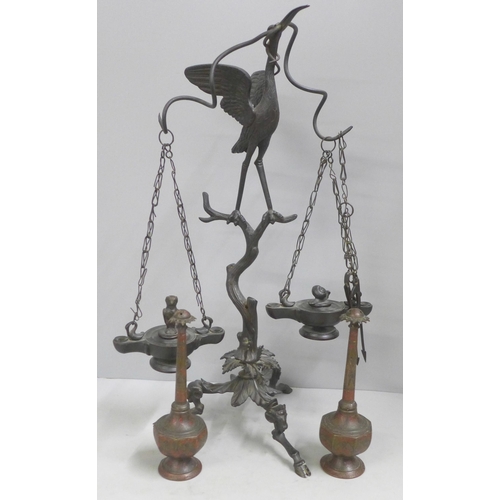 814 - A bronze 'Grand Tour' oil lamp in the form of a crane on top of a tree stump with snake entwined on ... 