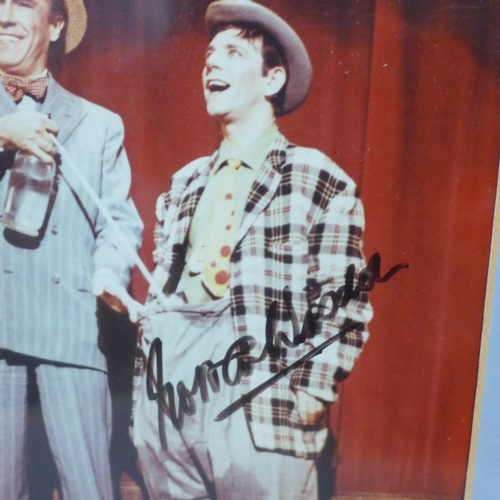 817 - Two autographed photographs; Doris Day and Norman Wisdom