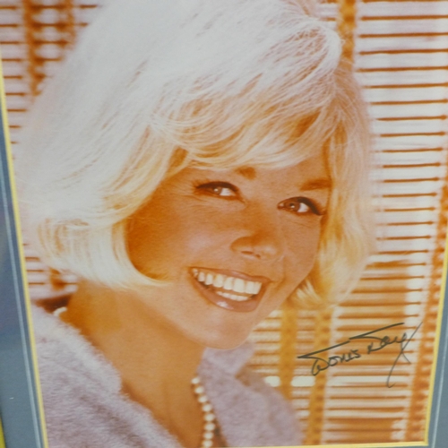 817 - Two autographed photographs; Doris Day and Norman Wisdom