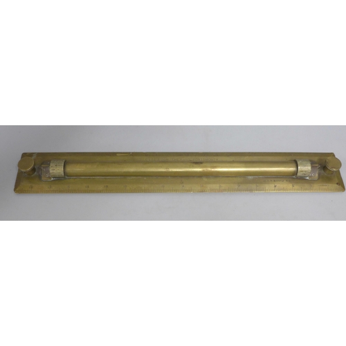 819 - A brass rolling ruler, G Lee & Son, The Hard Portsmouth, original owners stamp, owner H.H.R. Moore, ... 