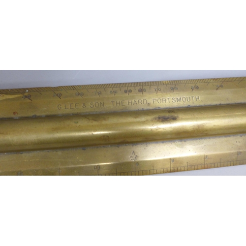 819 - A brass rolling ruler, G Lee & Son, The Hard Portsmouth, original owners stamp, owner H.H.R. Moore, ... 