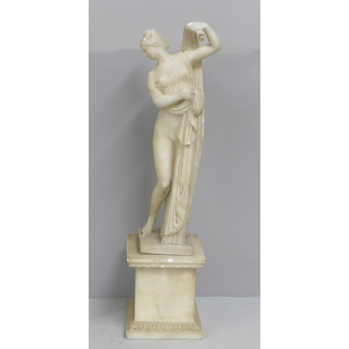 828 - An alabaster figure of the Goddess Venus Aphrodite, plinth restored, 50cm