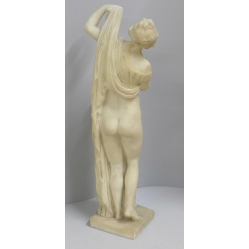 828 - An alabaster figure of the Goddess Venus Aphrodite, plinth restored, 50cm