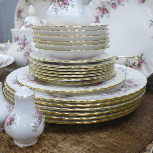 830 - Royal Albert Lavender Rose tea and dinnerwares, six setting, with tea pot, bowl, bread and butter pl... 