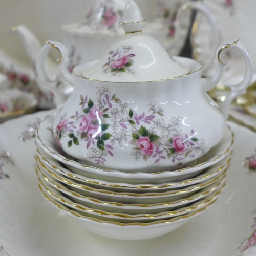 830 - Royal Albert Lavender Rose tea and dinnerwares, six setting, with tea pot, bowl, bread and butter pl... 