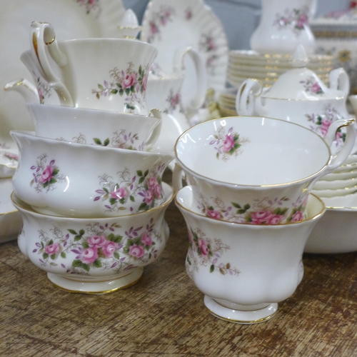 830 - Royal Albert Lavender Rose tea and dinnerwares, six setting, with tea pot, bowl, bread and butter pl... 