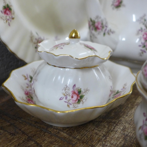 830 - Royal Albert Lavender Rose tea and dinnerwares, six setting, with tea pot, bowl, bread and butter pl... 