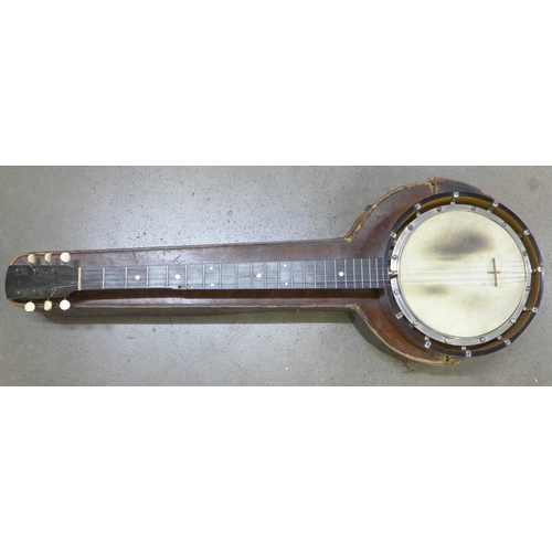 832 - A late 19th Century banjo, marked 'Unwarpable, patent no. 23974 Rd. 294951', with inlaid case and le... 