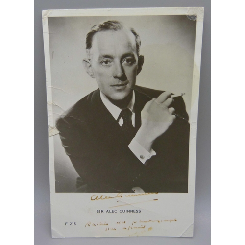 846 - A Sir Alec Guinness autographed postcard, (Star Wars, Fagin, etc.)