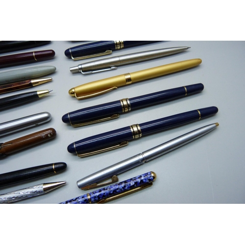 888 - A collection of fountain pens and ballpoint pens, (no gold nibs)