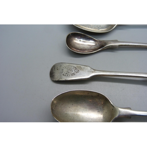 891 - Four silver spoons including three with The Queens 24th Battalion County of London Regiment emblem, ... 