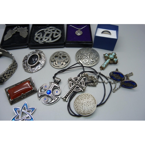 906 - A collection of pewter jewellery including St. Justin, some boxed