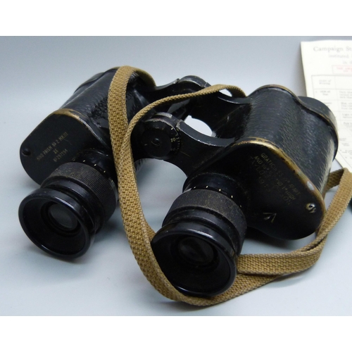 913 - A pair of military issue binoculars, Taylor-Hobson, 1943, and a pair of WWII medals in original post... 