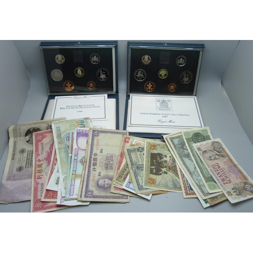 915 - Two Royal Mint proof coin sets and assorted bank notes