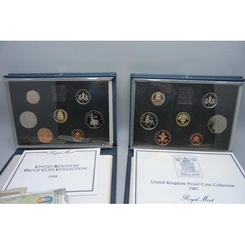 915 - Two Royal Mint proof coin sets and assorted bank notes